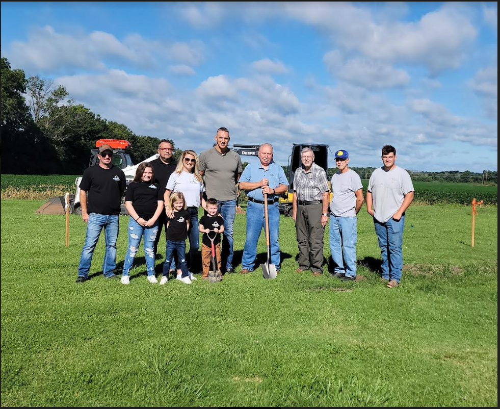 Ground breaking for the new playground took place August 7, 2023. Pictured: Cort Huff with Huff's Mini Excavating, Aliyah Huff, Aniyah Huff, Brodyx Huff, Alysia Huff, Matt Woodruff and Chad Everett with The Roads Church, Village trustee Wayne McKenzie, Ma